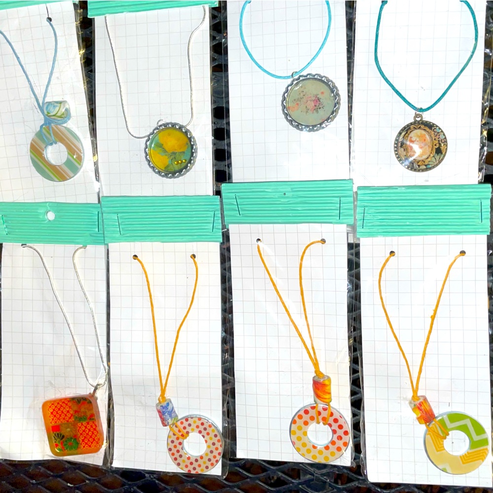 Group of 8 pendant style necklaces